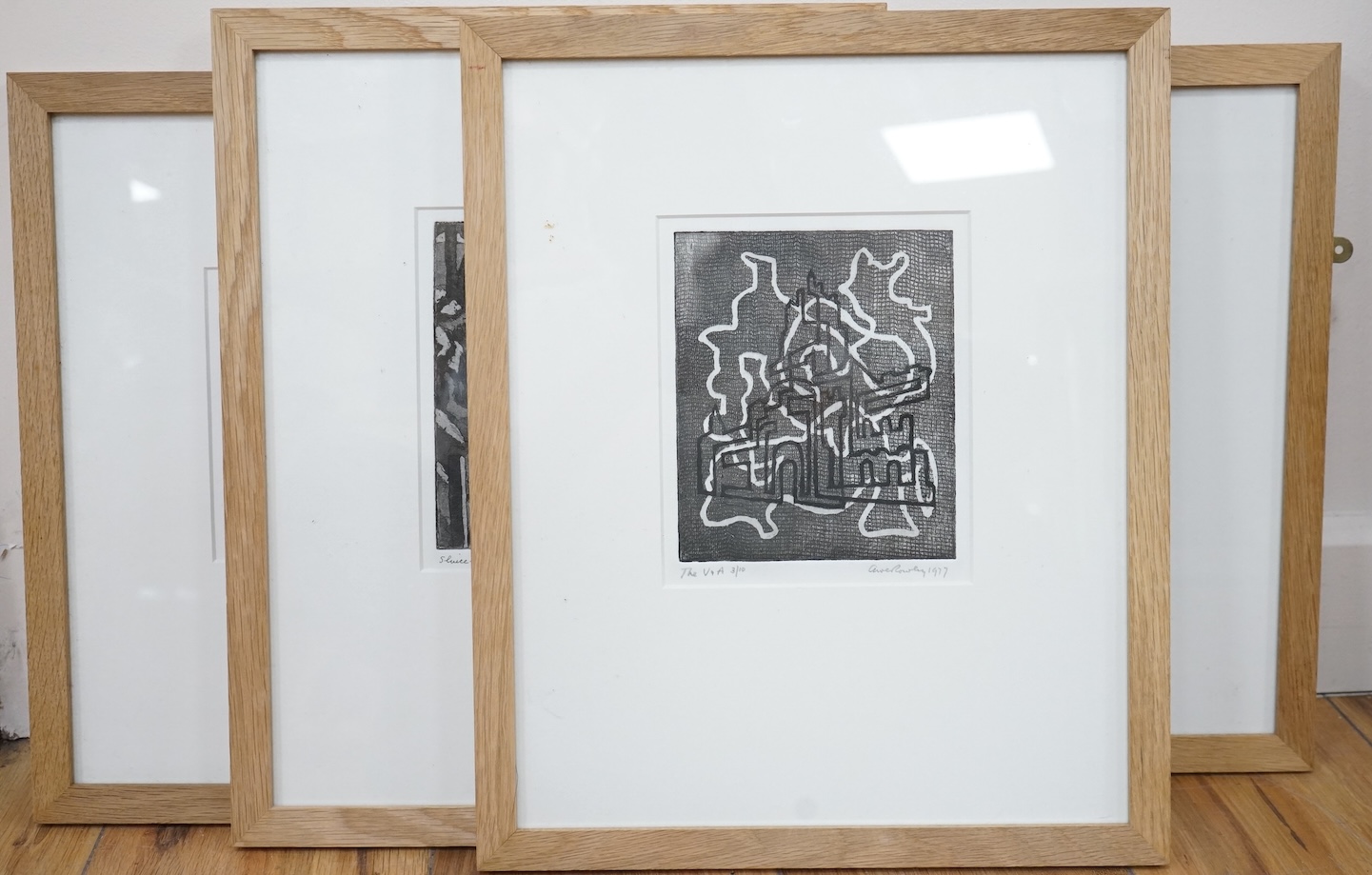 Owen Rowley (1906-1987), ‘The V&A 1977’, ‘Sluice Gate’, ‘Night Chelsea’ and ‘Littlehampton Beach’, each signed and dated in pencil, details verso, set of four etchings, 14 x 16cm